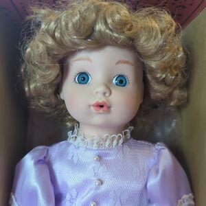 Porcelain Doll Brinn's Collectible 16" 1992 blond hair and purple white dress